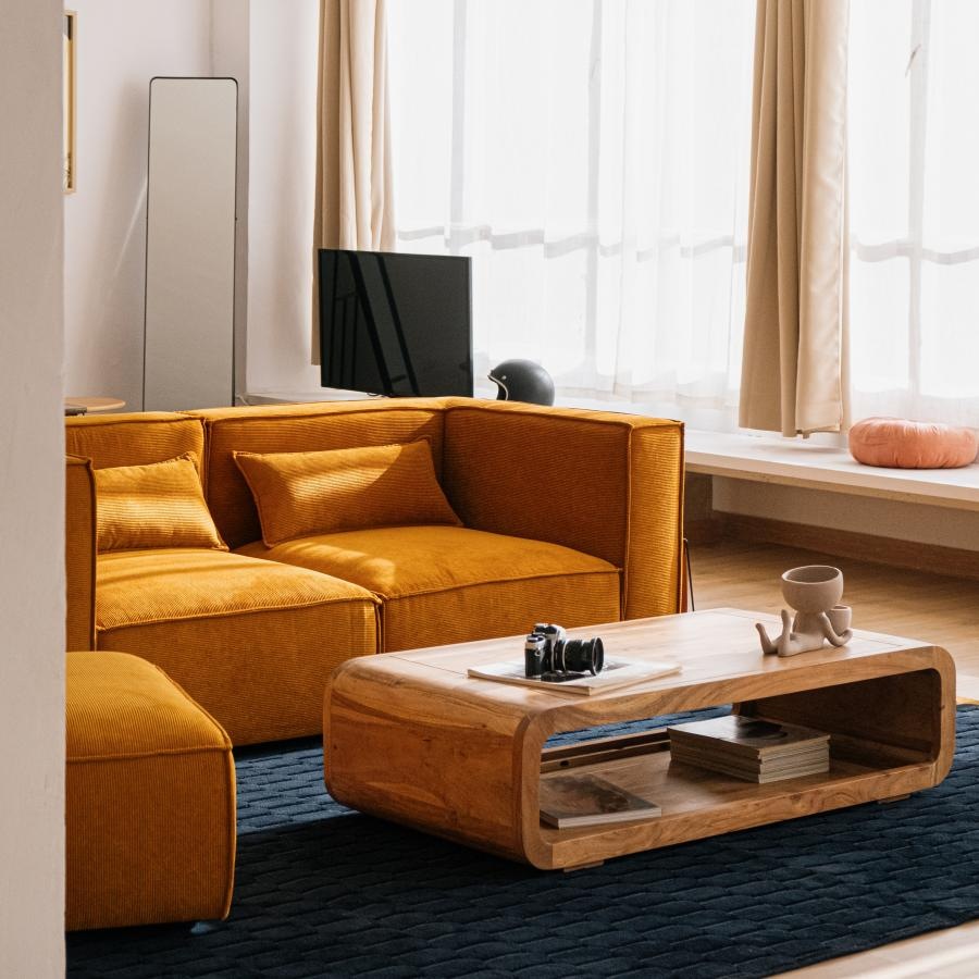 a living room with a couch and a coffee table